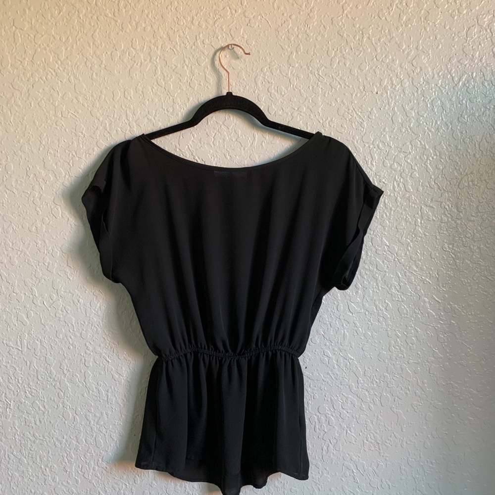 Black blouse.